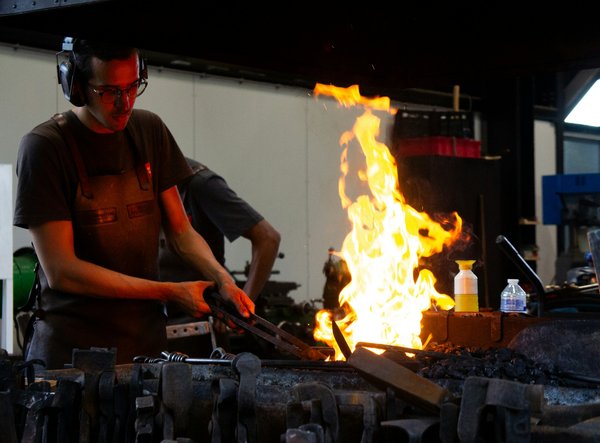 What are the top-rated locations in the UK for learning about traditional British blacksmithing techniques?